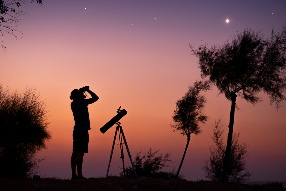 Telescope at night viewing stars