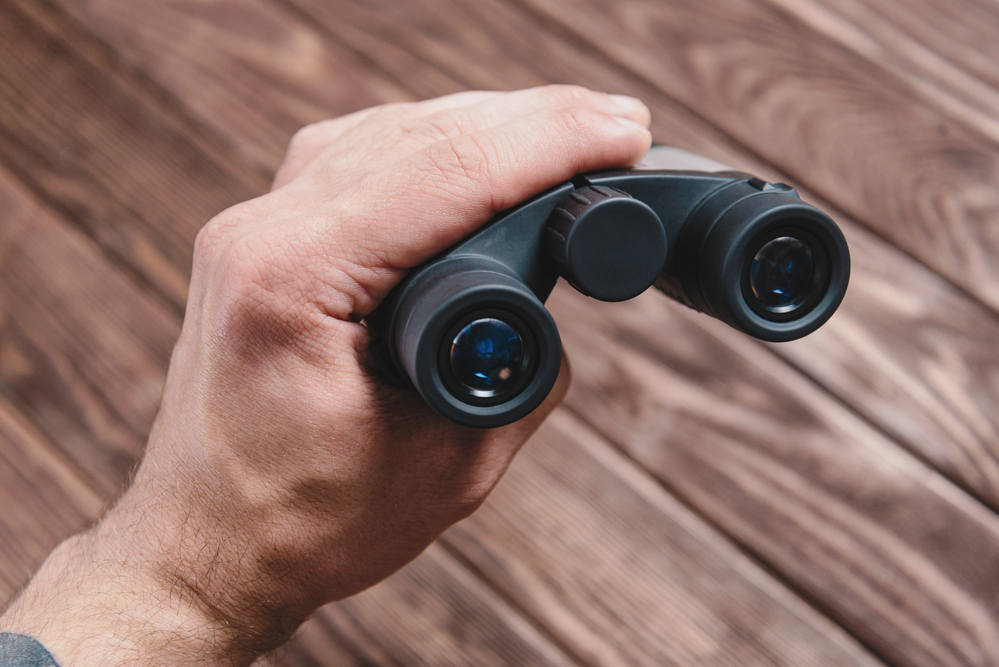 a man holding his long range device