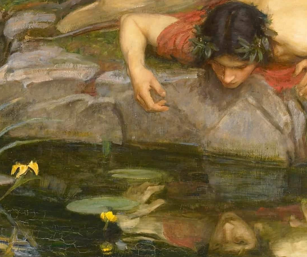 Narcissus staring into a pool